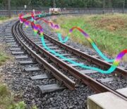 Development of sensors to determining velocity and position of rail vehicles using existing infrastructure elements along the railway track